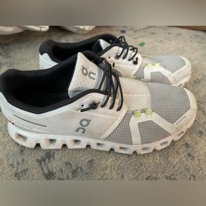White gray and green On Cloud running shoes